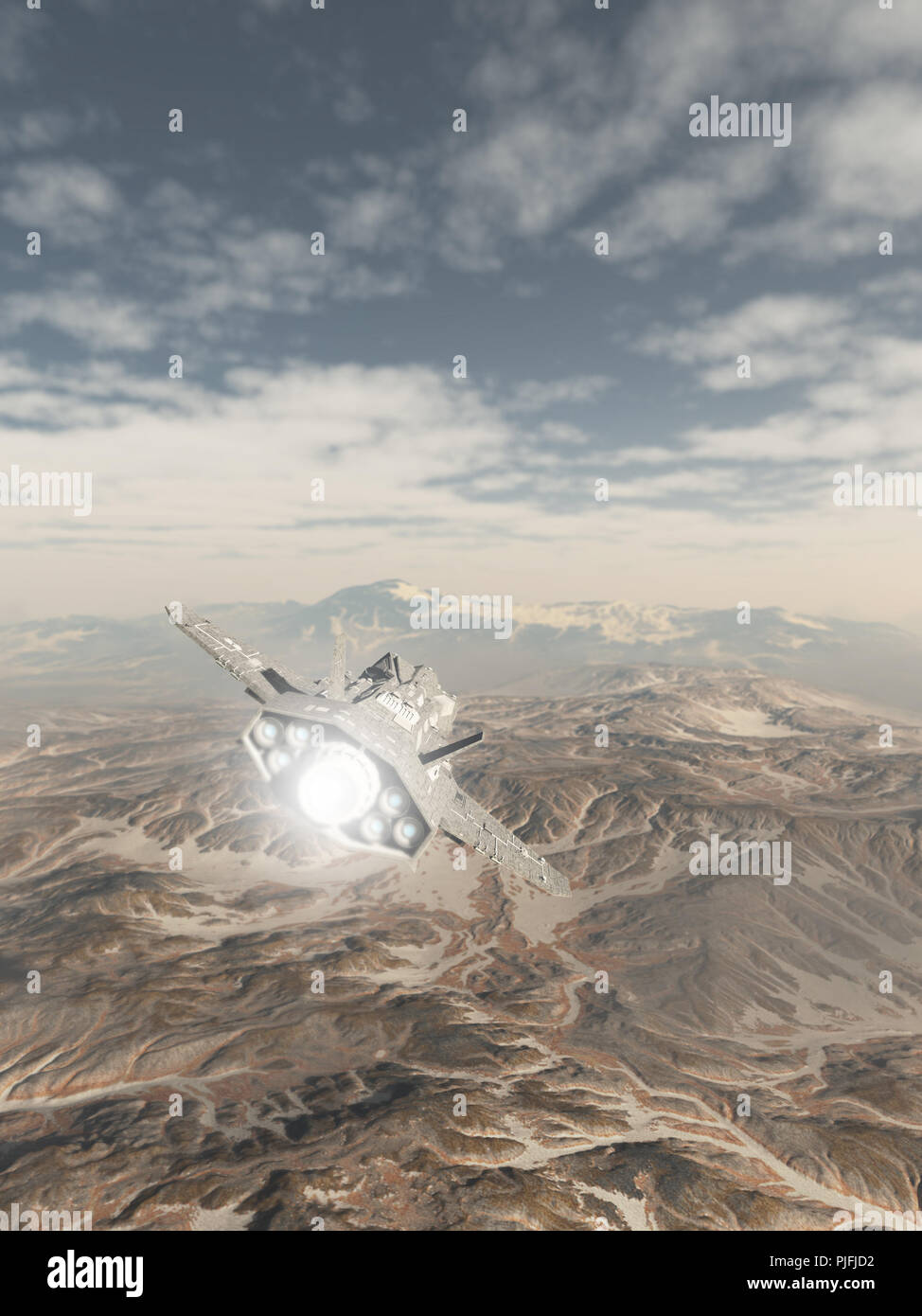 Raumschiff fliegen über eine verschneite Berglandschaft Stockfoto