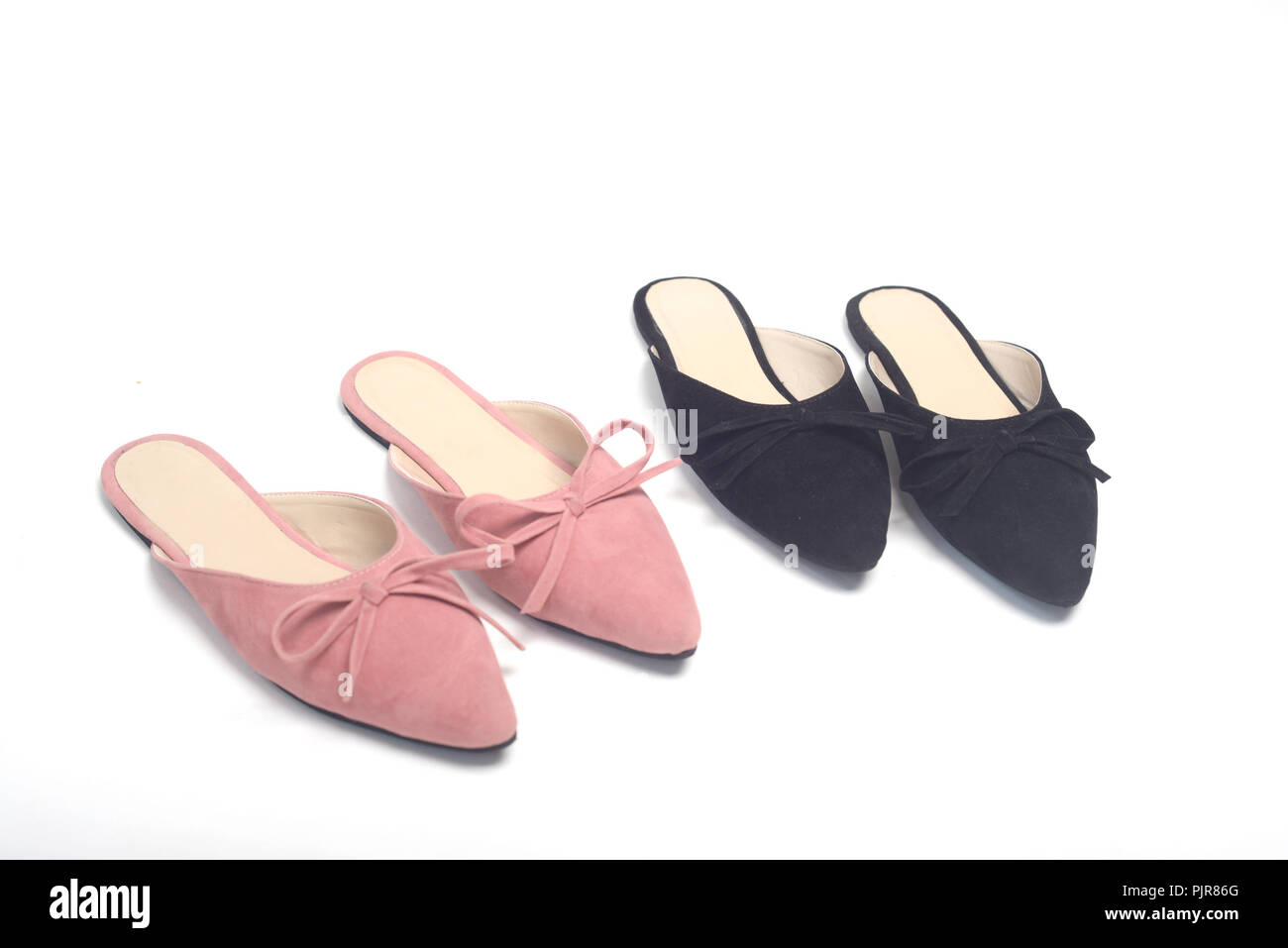 Mädchen Schuhe auf weißem Hintergrund Stockfoto