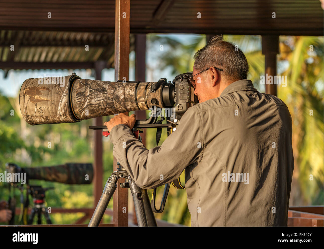 Fotograf mit langen Objektiv, Costa Rica. Stockfoto