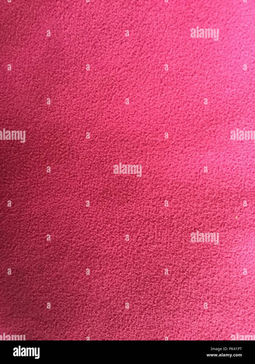 Nahaufnahme von roten Samt Material, Hintergrund. Stockfoto