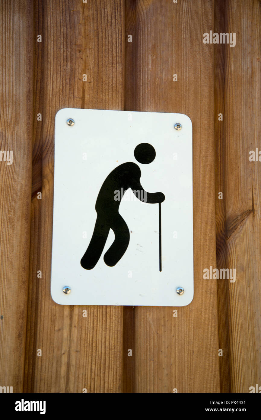 Hackney, London. London Felder. Alte person Symbol auf der WC-Tür Stockfoto