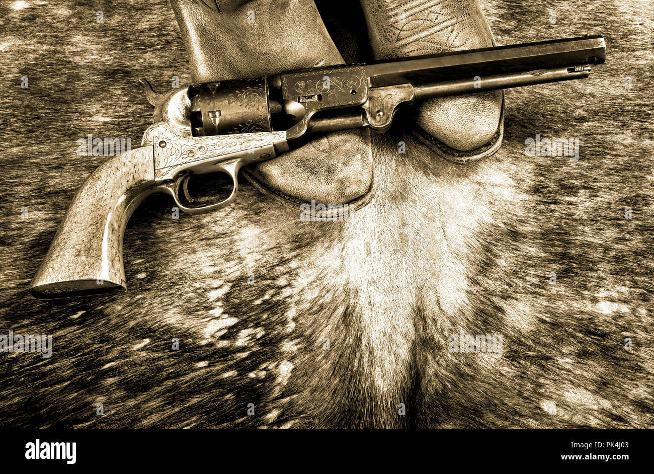 Cowboystiefel und Western Cowboy Pistole in Schwarz und Weiß. Stockfoto