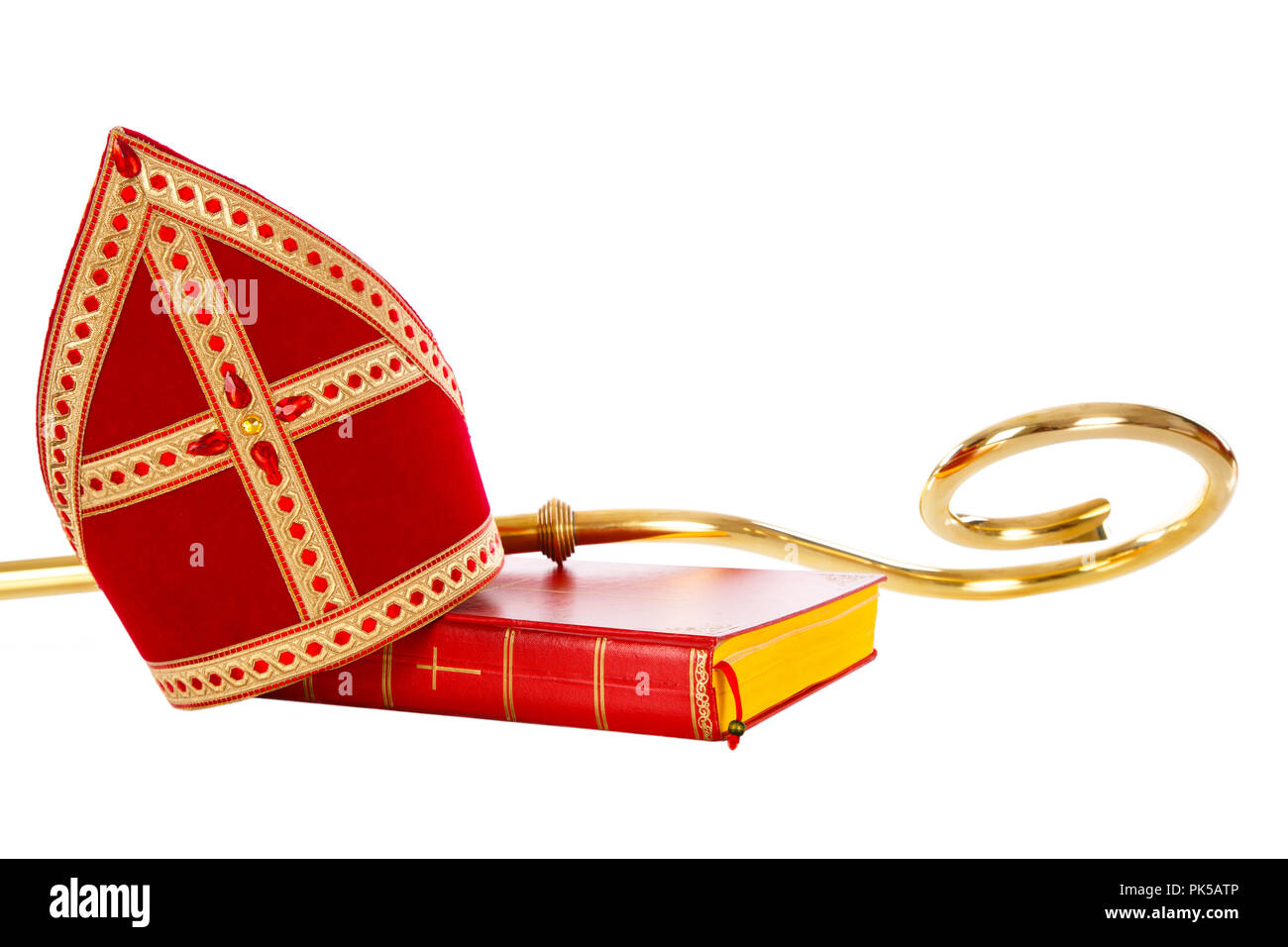 Gehrung oder Mitre Buch und Mitarbeiter des Heiligen Nikolaus. Auf weißem Hintergrund isoliert. Teil einer niederländischen santa Tradition Stockfoto
