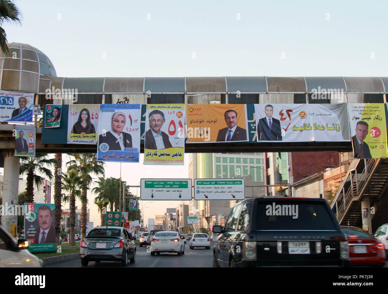 Erbil, Irak. 11 Sep, 2018. Poster von Kandidaten aus verschiedenen politischen Parteien sind in Erbil Kurdistan, Irak gesehen, Sept. 11, 2018. Die Wahlen Kampagne begann am Dienstag in der Irakischen semi-autonome Region Kurdistan als Kandidaten ins Rennen um die Sitze im Landtag vor Sept. 30 Stimmen. Credit: Yasser Jawad/Xinhua/Alamy leben Nachrichten Stockfoto