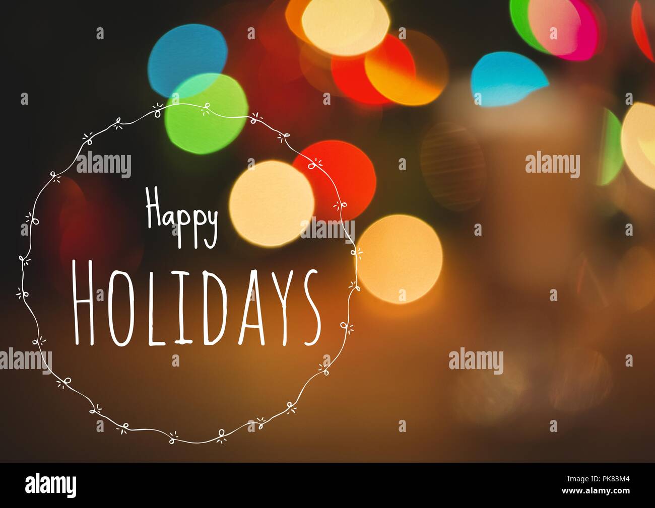 Happy holidays Text mit magischen Lichter Stockfoto