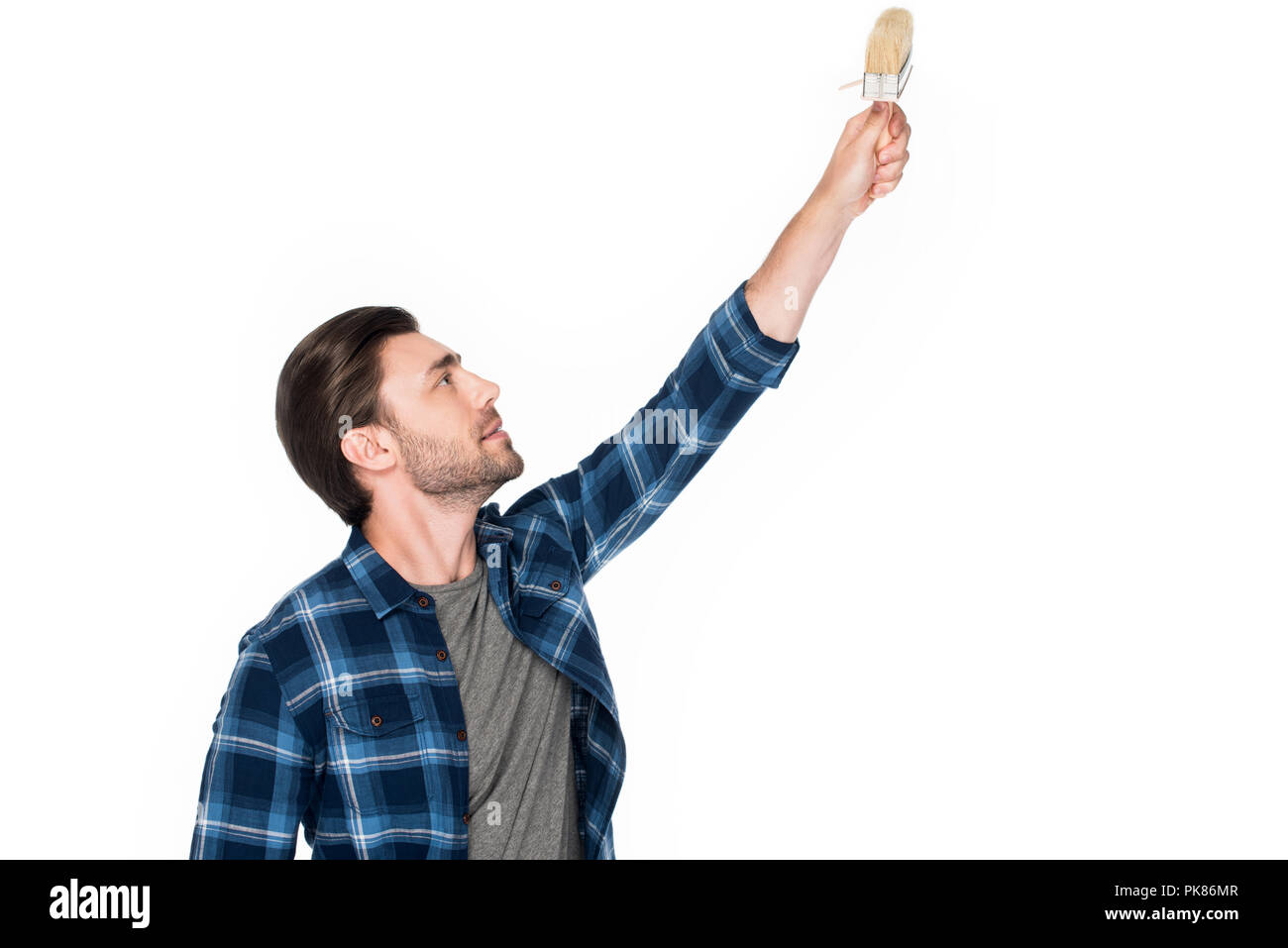 Seitenansicht des Menschen Gemälde von Pinsel auf weißem Hintergrund Stockfoto