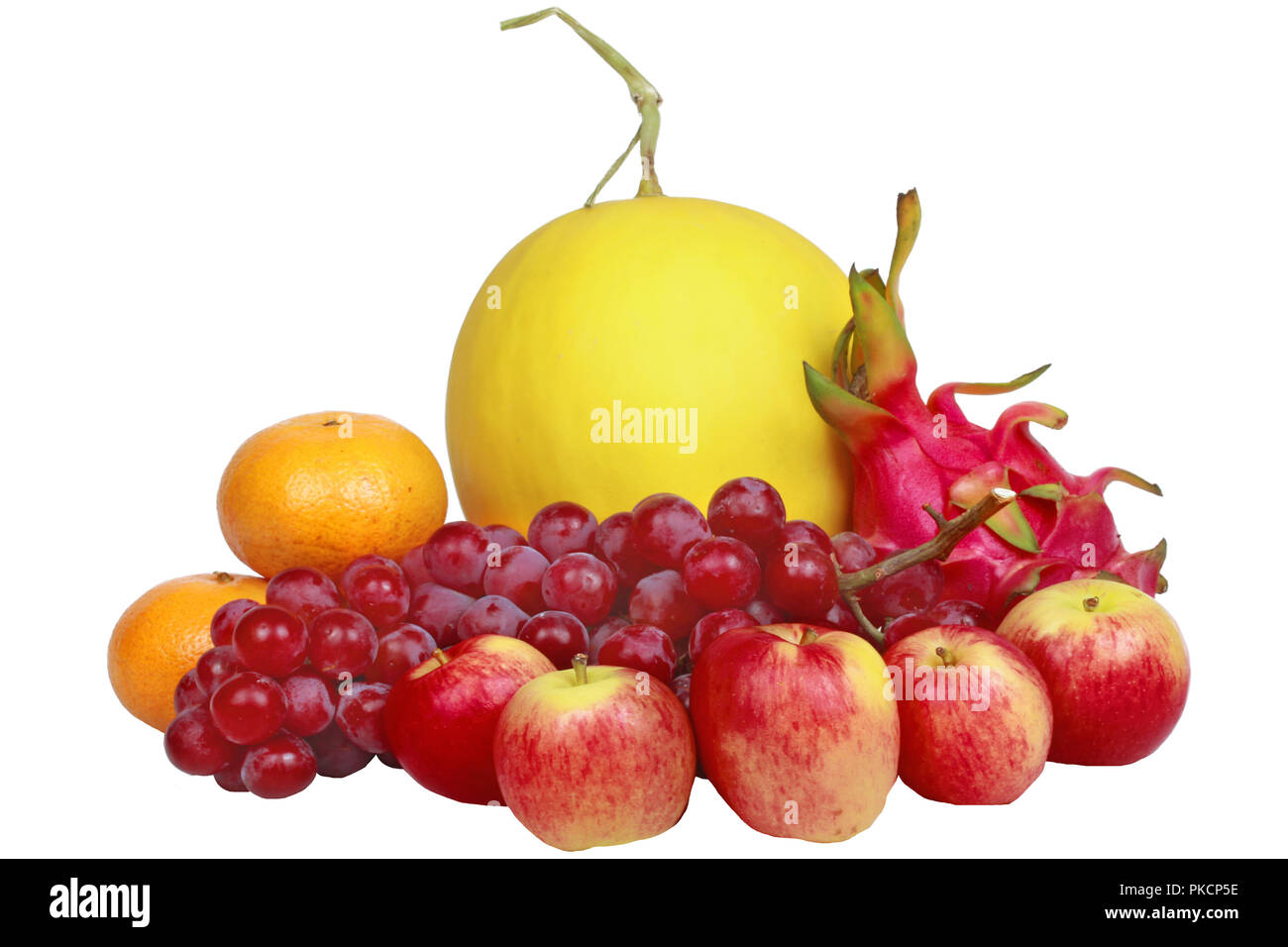 Der Nahrung für Gesundheit isoliert, gemischtes Obst als Rote kernlose Trauben, Orangen, Apfel, Drachenfrucht, Japanisch goldene Melone. Kein Fleisch Rezept. Stockfoto