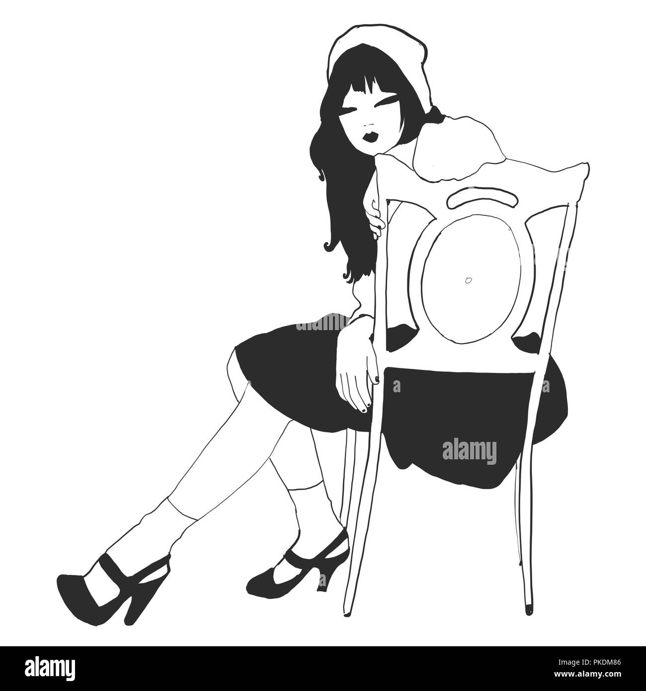 Mode Mädchen sitzen auf Stuhl in Schwarz und Weiß Stockfoto