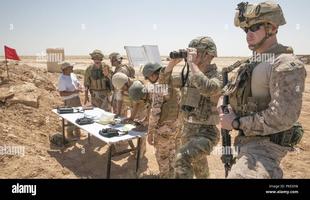 Die 7 irakische Armee Abteilung führt eine Artillerie Feuer Übung mit Koalition Teilnehmer, im Al Asad Airbase, Irak, 31. Juli 2018. Eine Koalition von 77 Mitglieder haben sich zum Ziel gesetzt, die Beseitigung der Bedrohung durch die ISIS im Irak und in Syrien stellten verpflichtet und haben in verschiedenen Kapazitäten an der Bemühung beigetragen. Die Breite und Vielfalt der Koalitionspartner zeigt die globalen und einheitlichen Ziel eines dauerhaften Niederlage von ISIS im Irak und in Syrien. Stockfoto