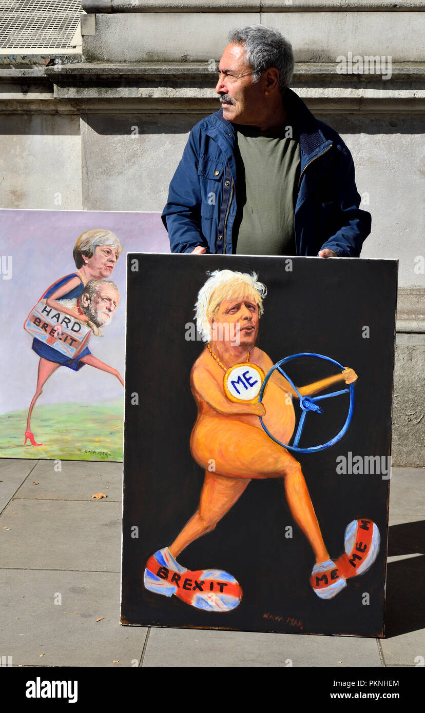London, England, UK. Kaya Mar (Künstler) mit zwei Brexit Cartoons außerhalb der Downing Street während einer 3-stündigen Kabinettssitzung zu Brexit, Sept. 13 20 diskutieren Stockfoto