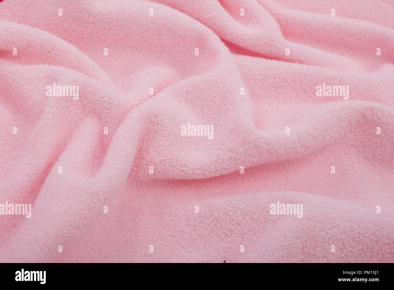 Volle Seite Nahaufnahme von rosa Stoff Textur. Rosa, weiche Textur für Hintergrund. Stockfoto