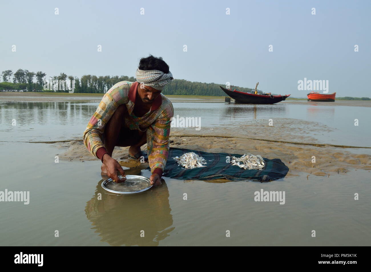 Das tägliche Leben der Fischer, verwenden Sie fischernetz Fische zu fangen. Angeln in Indien ist ein wichtiger Wirtschaftszweig, in dem ich in Indien, die Beschäftigung von Millionen Menschen. Stockfoto