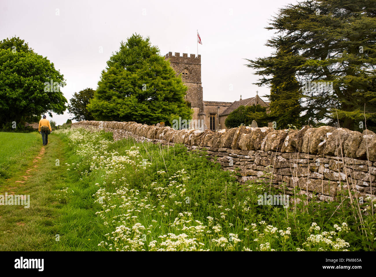 St. Michaels and All Angles Church in Guiting Power im Cotswold District of England. Stockfoto