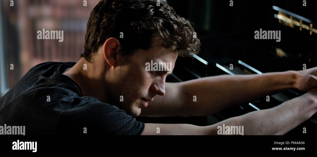 JAMIE DORNAN Sterne wie Christian Grau in '50 Graustufen'. Stockfoto