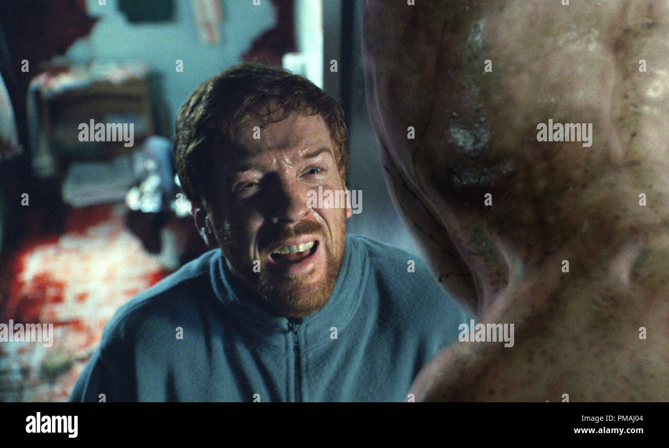 DAMIAN LEWIS Gesichter "Mr. Grau' in Castle Rock Entertainment's und Village Roadshow Pictures' übernatürlichen Thriller 'Dreamcatcher' von Warner Bros. Pictures vertrieben. 2003 Stockfoto