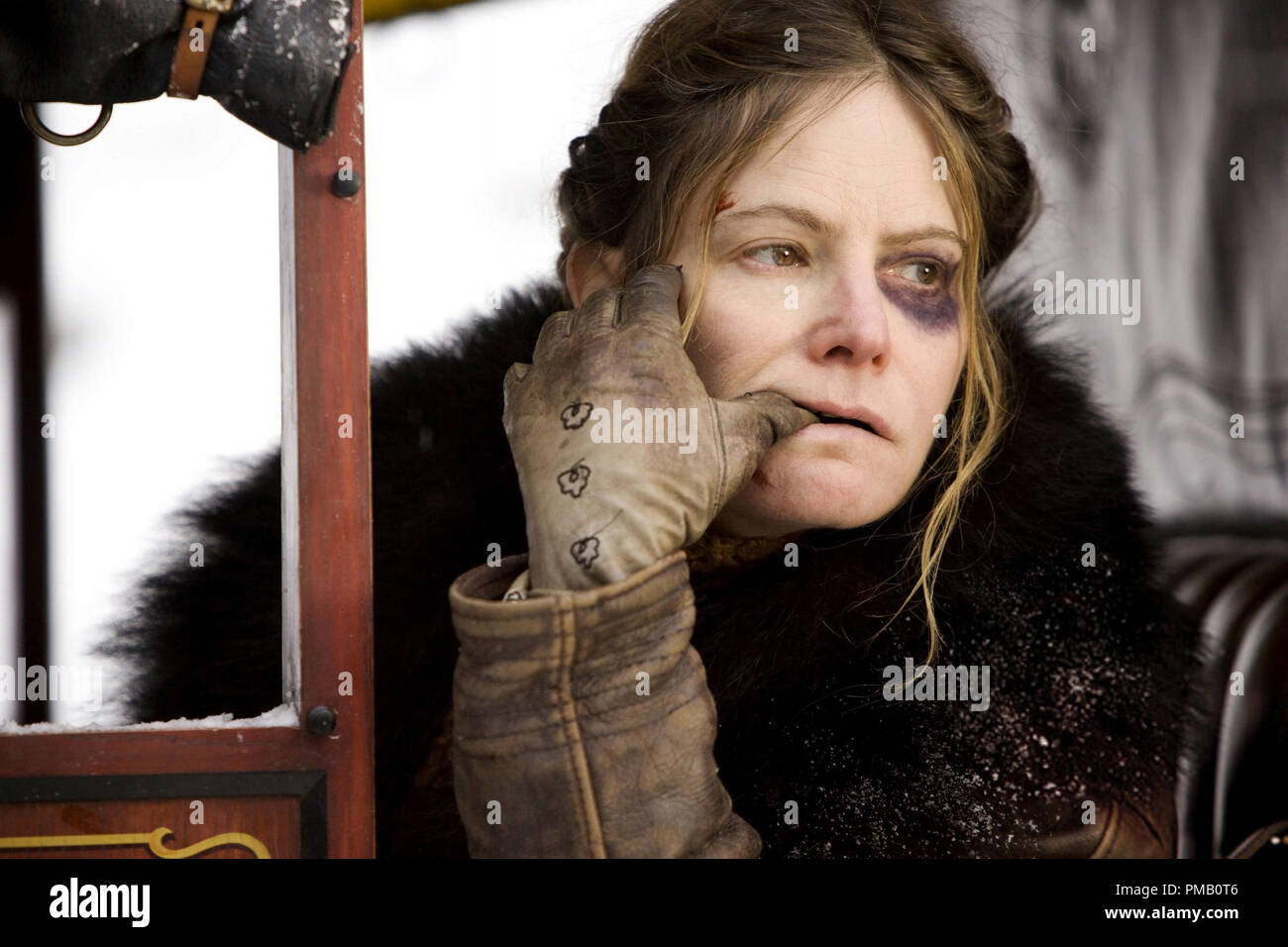 Erfüllen die HASSERFÜLLTE ACHT: Jennifer Jason Leigh stars als Daisy Domergue Stockfoto