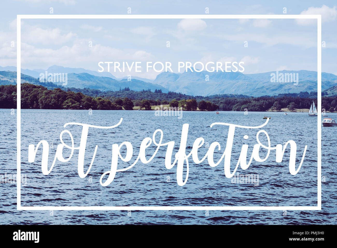Streben nach Fortschritt nicht Perfektion - Lake Windermere Hintergrund Stockfoto