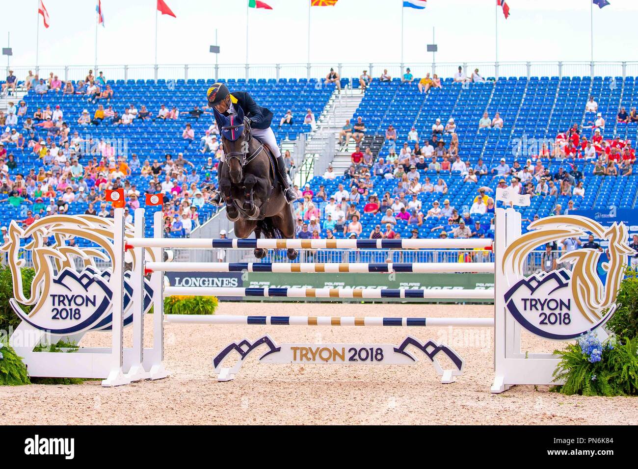 Tryon, Kalifornien, USA. Sept 2018 19. Carlos Enrique Lopez Lizarazo reiten Admara. COL. FEI World Team & Individuelle Jumping Championships. Erste Konkurrenz. Springen. 1,55 m. Tabelle C. Tag 8. World Equestrian Games. WEG 2018 Tryon. North Carolina. USA. 19.09.2018. Credit: Sport in Bildern/Alamy leben Nachrichten Stockfoto