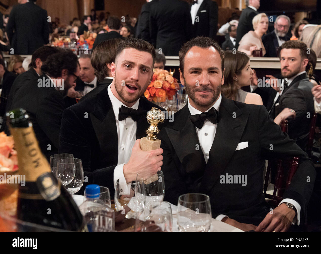Aaron Taylor-Johnson und Tom Ford nehmen an der 74. jährlichen Golden Globe Awards im Beverly Hilton in Beverly Hills, CA am Sonntag, 8. Januar 2017. Datei Referenz # 33198 956 GFS nur für redaktionelle Verwendung - Alle Rechte vorbehalten Stockfoto