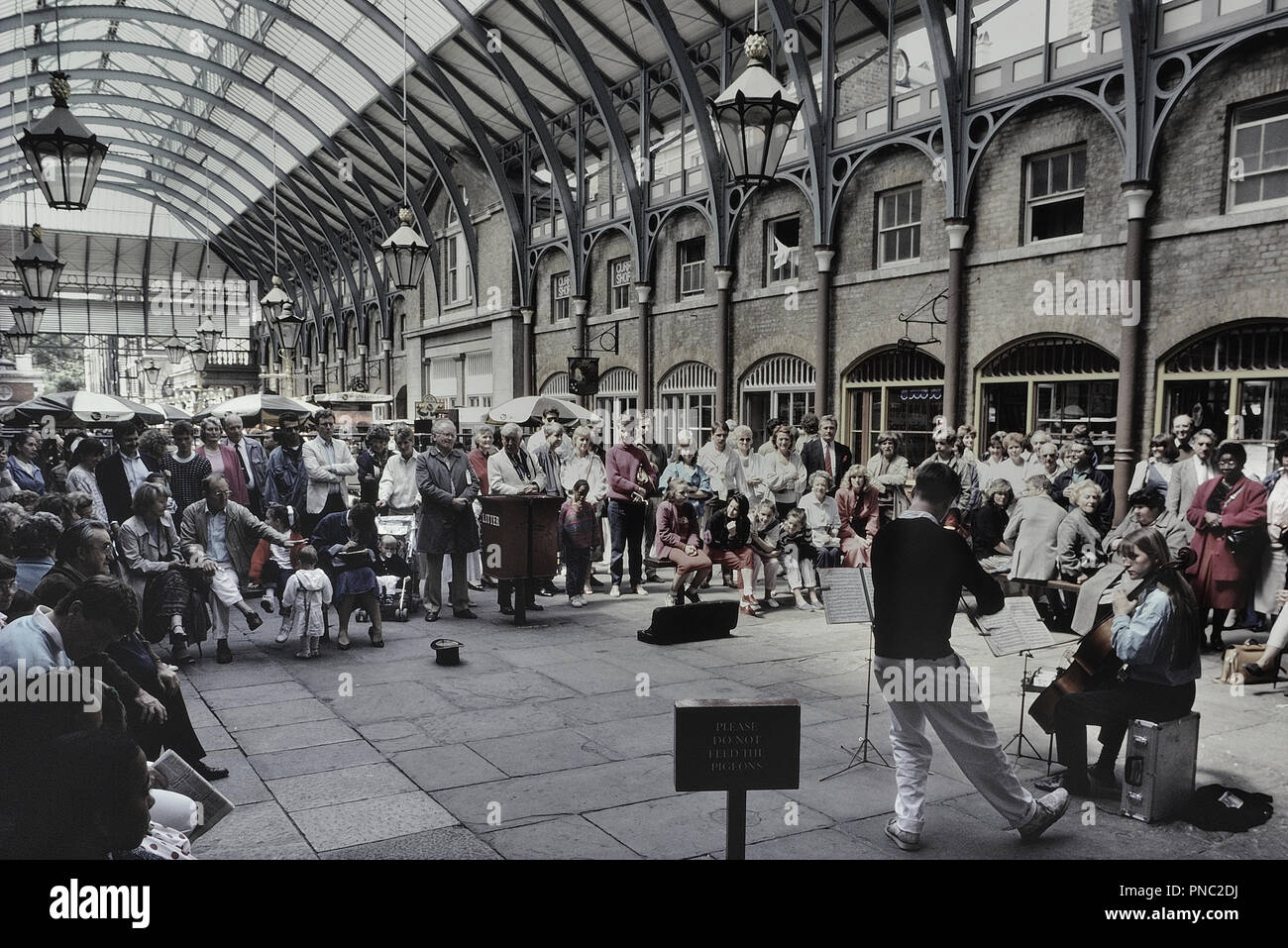 Musiker Straßenmusik, Covent Garden, London, England, UK. Ca. 80er Stockfoto