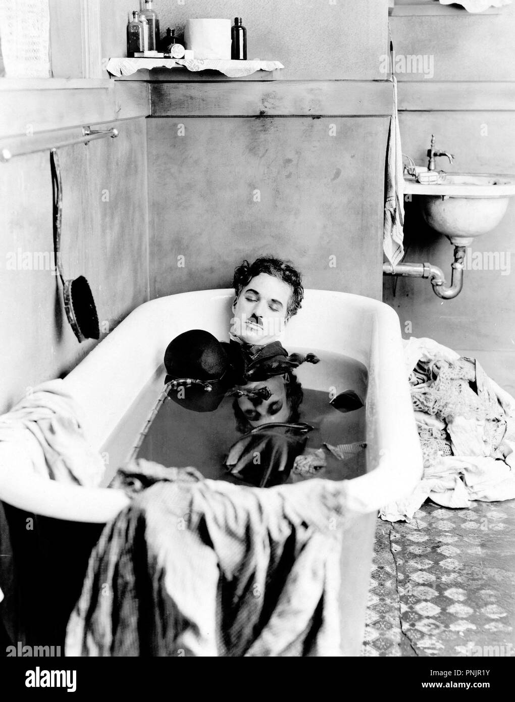 Original Film Titel: PAY DAY. Englischer Titel: PAY DAY. Jahr: 1922. Regisseur: Charlie Chaplin. Stars: Charlie Chaplin. Credit: Charles Chaplin Produktionen/Album Stockfoto