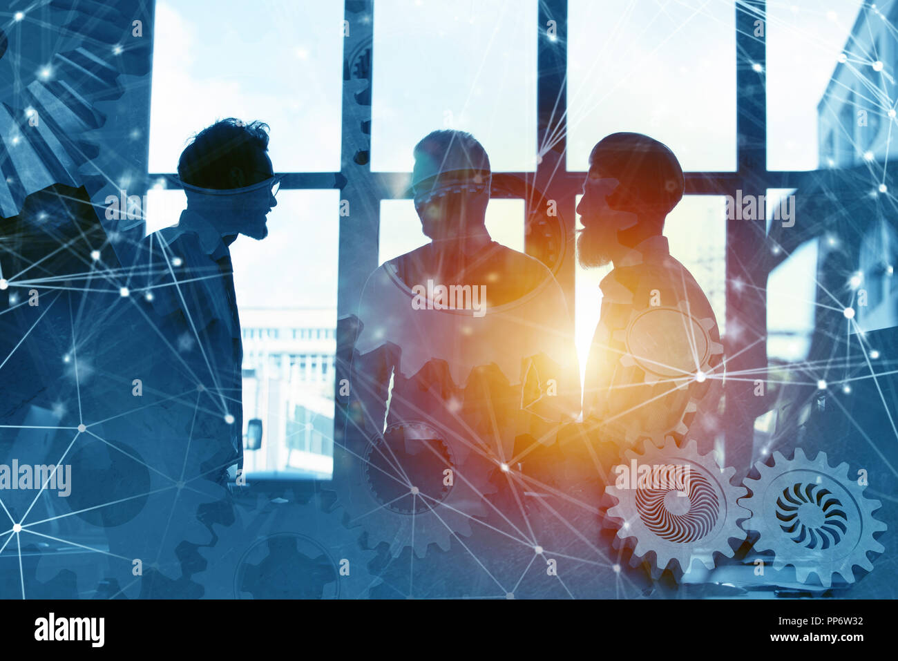 Business Team mit Zahnrädern. Teamarbeit, Partnerschaft und Integration Konzept mit Netzwerk Wirkung. Double Exposure Stockfoto