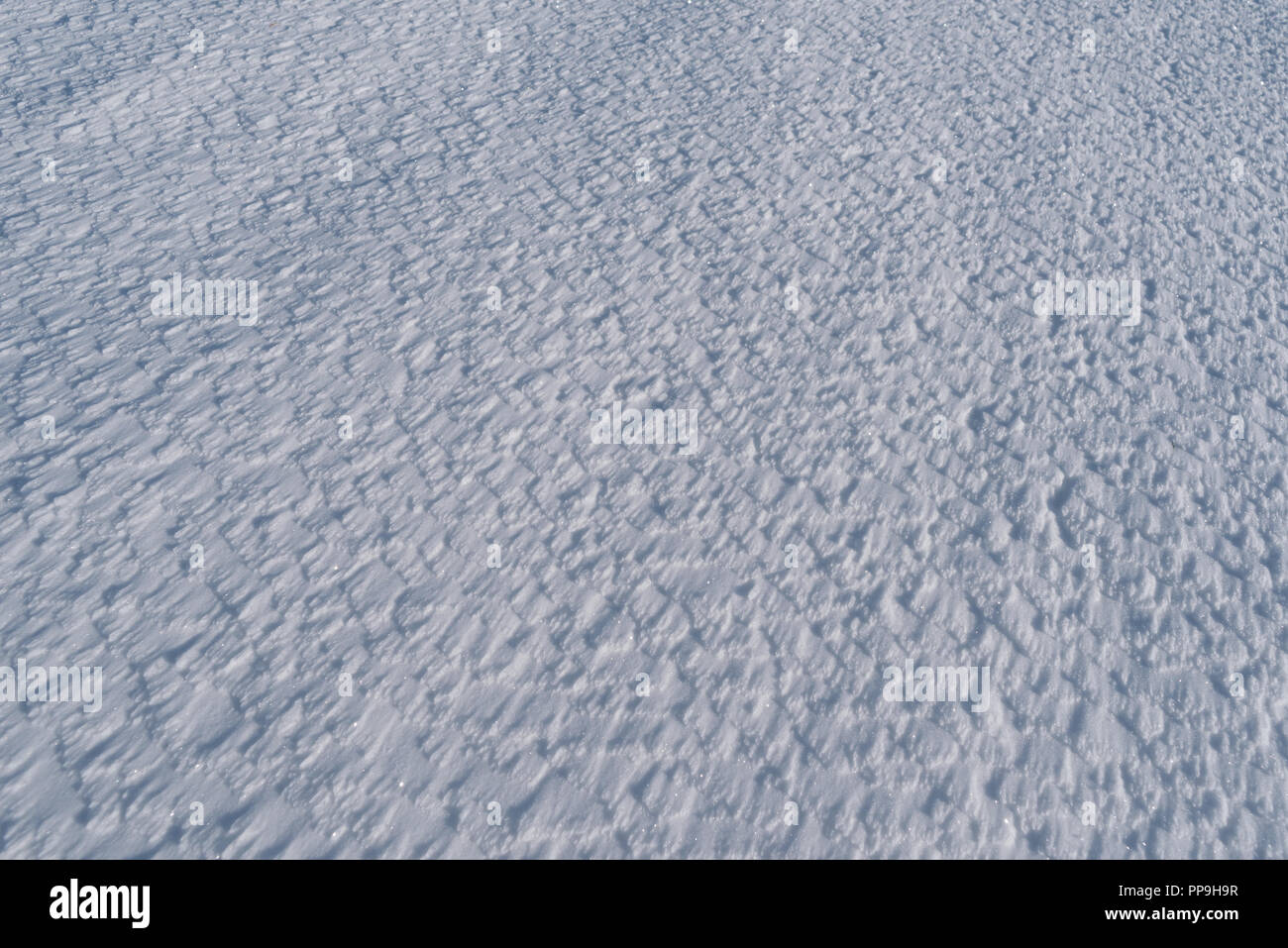 Abstrakte Textur verwitterten Schnee. Hintergrund für Design Stockfoto