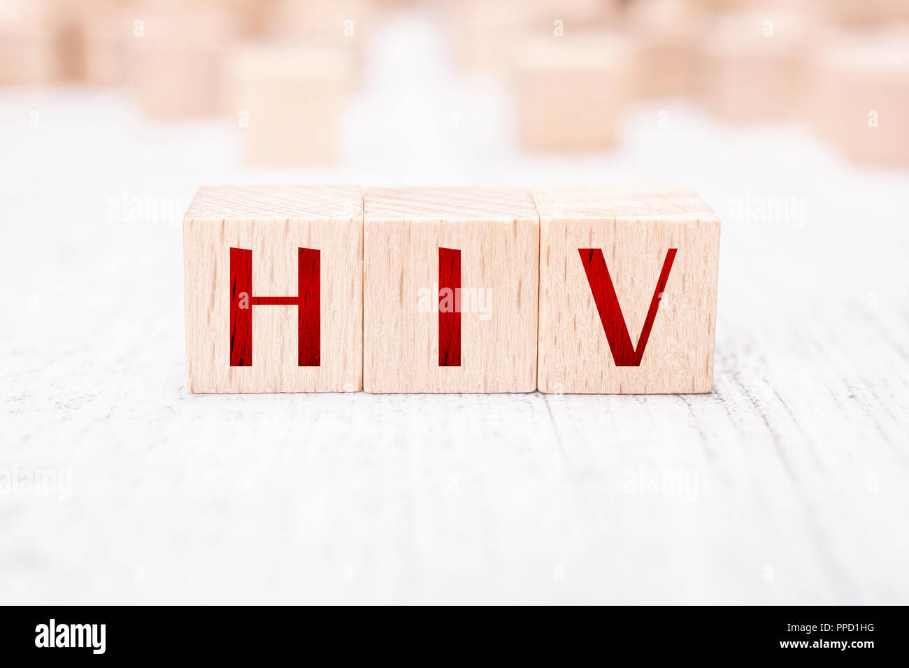 Die Abkürzung HIV gebildet von hölzernen Blöcke auf einem weißen Tisch Stockfoto