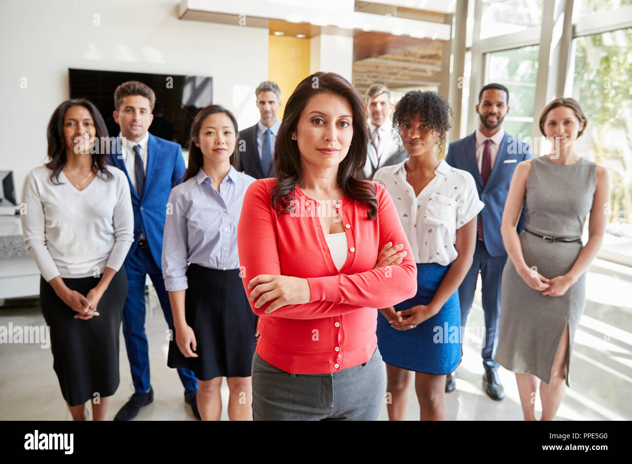 Hispanic Geschäftsfrau und Ihr Business Team, Gruppe portrait Stockfoto