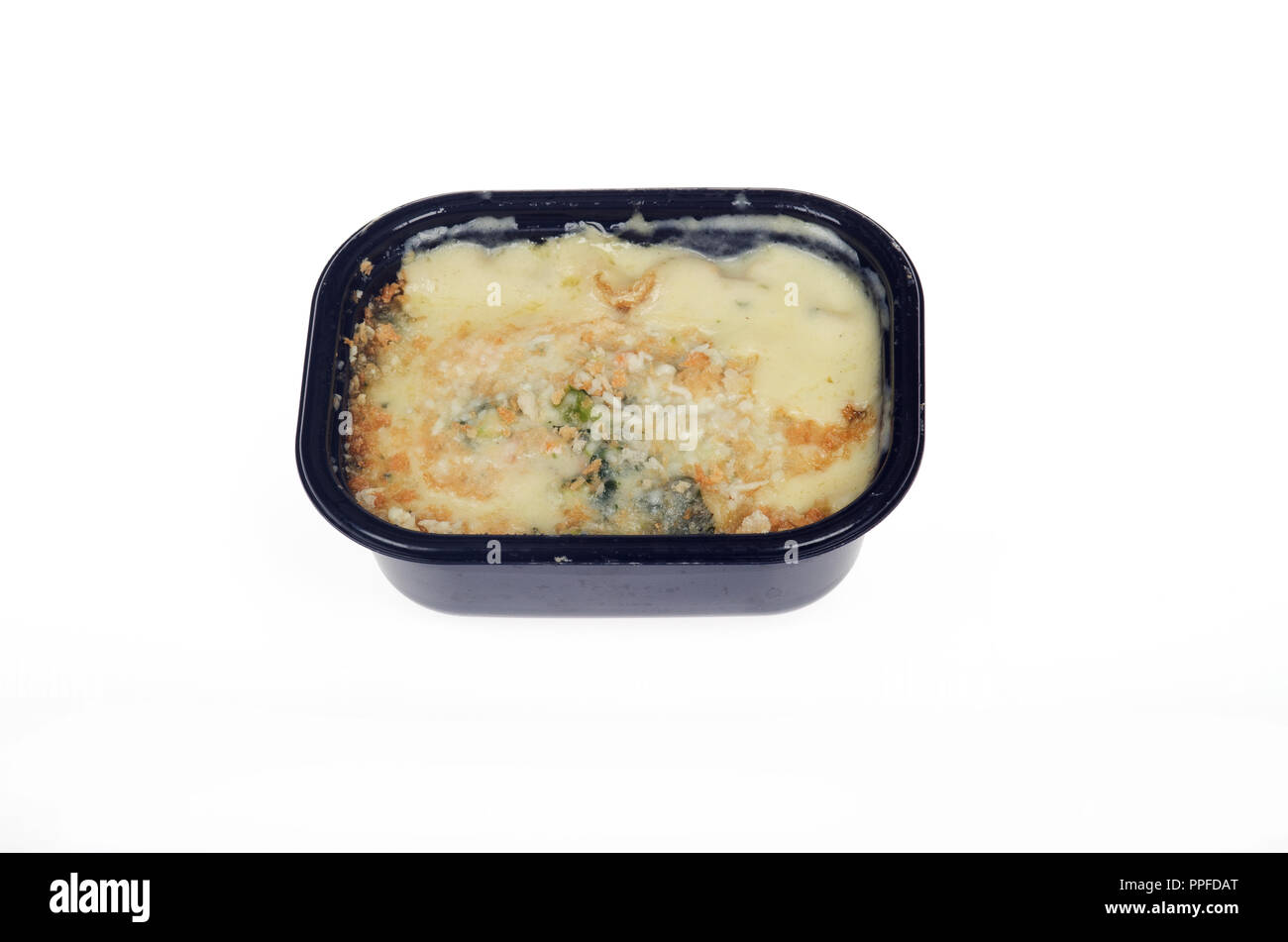 Gefrierschrank Mahlzeit Gemüse Lasagne in microwaveable aus schwarzem Kunststoff Behälter Stockfoto