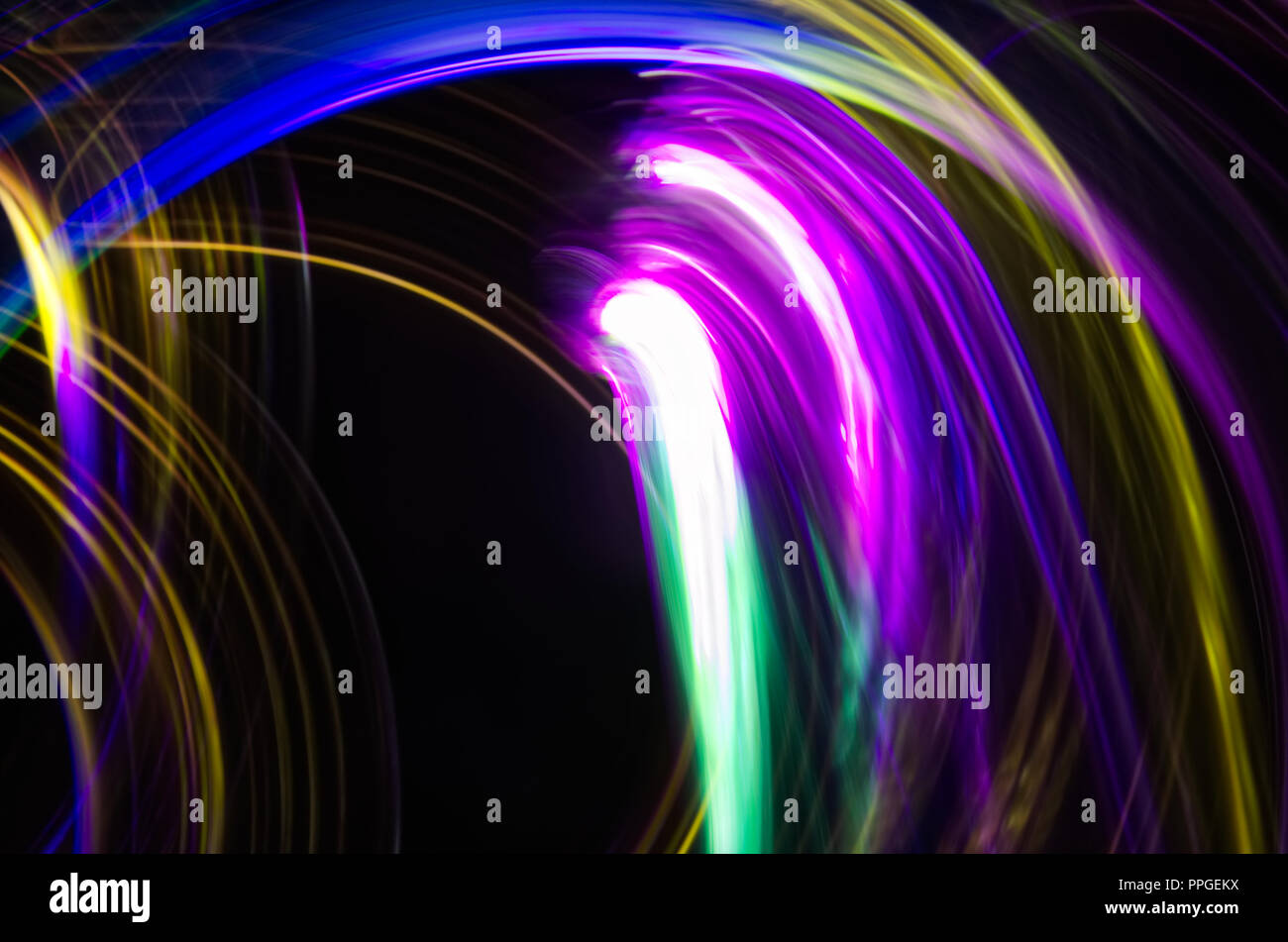 Zusammenfassung Hintergrund gut für eine Anzeige, hübsche wirbelt der Licht, in hellen Farben. Neon-effekt. Stockfoto