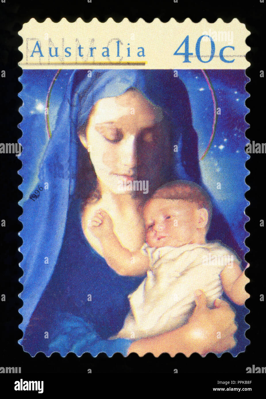 Australien - ca. 1996: eine stornierte Briefmarke aus Australien, zeigt die Darstellung von Maria und das Jesuskind, Gedenken an Weihnachten, ca. 199 Stockfoto
