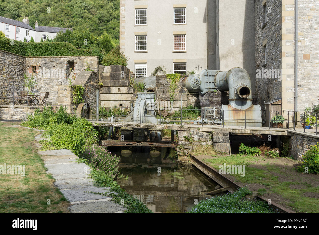 Restaurierte turbine Maschinen an Cressbrook Mühle aus dem 19. Jahrhundert, eine alte Baumwollspinnerei, die jetzt für den häuslichen Gebrauch wiederhergestellt; Derbyshire, Großbritannien Stockfoto