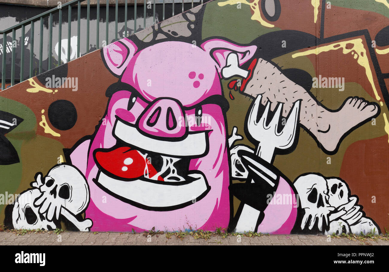 Schwein frisst Menschenfleisch, Graffiti, Kritik des Fleischkonsums, vegan leben, Düsseldorf-Eller, Nordrhein-Westfalen, Deutschland Stockfoto