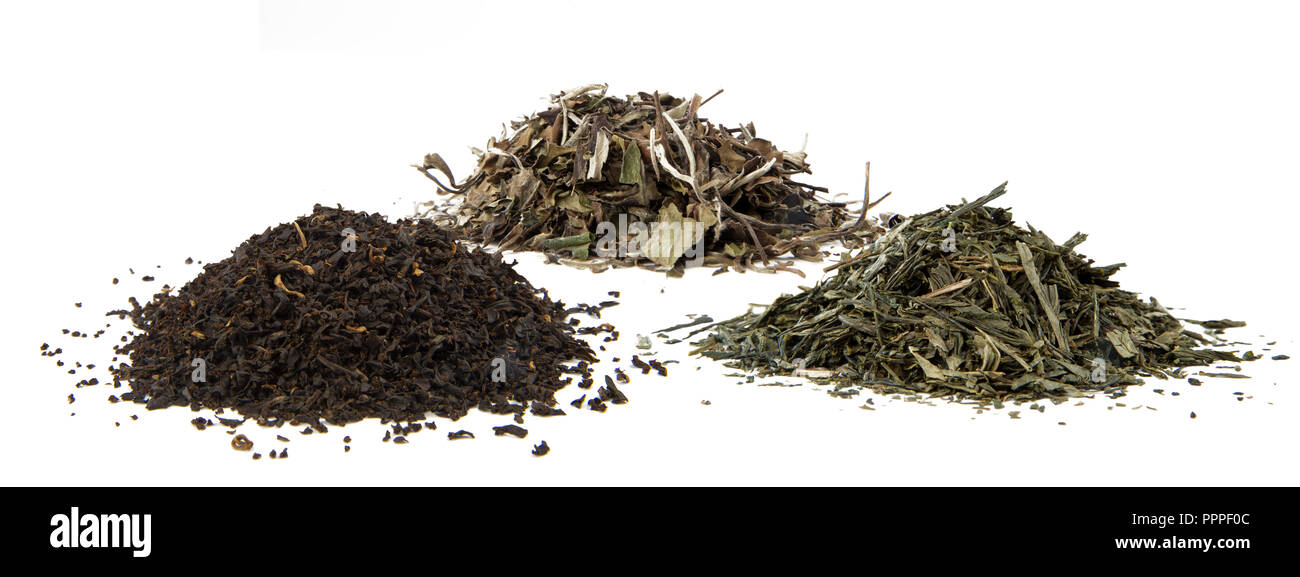 Kleine Haufen von Grüner Tee, weisser Tee, schwarzer Tee Stockfoto