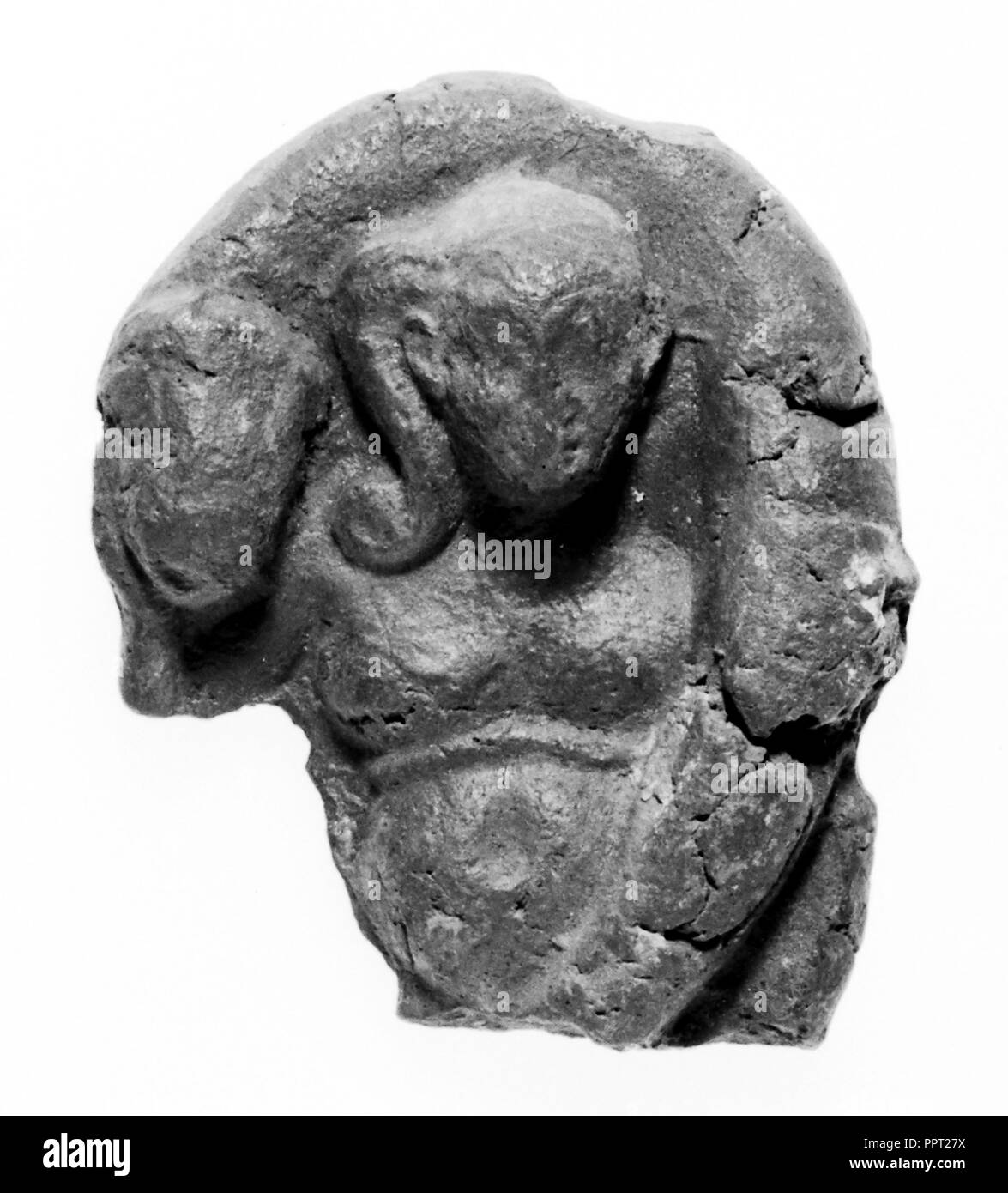 Entlastung der Grotesken phallische Harpokrates; Ägypten; 1./2. Jahrhundert; Terracotta, sehr dunkel rot-braun, 9,5 x 7,5 cm Stockfoto