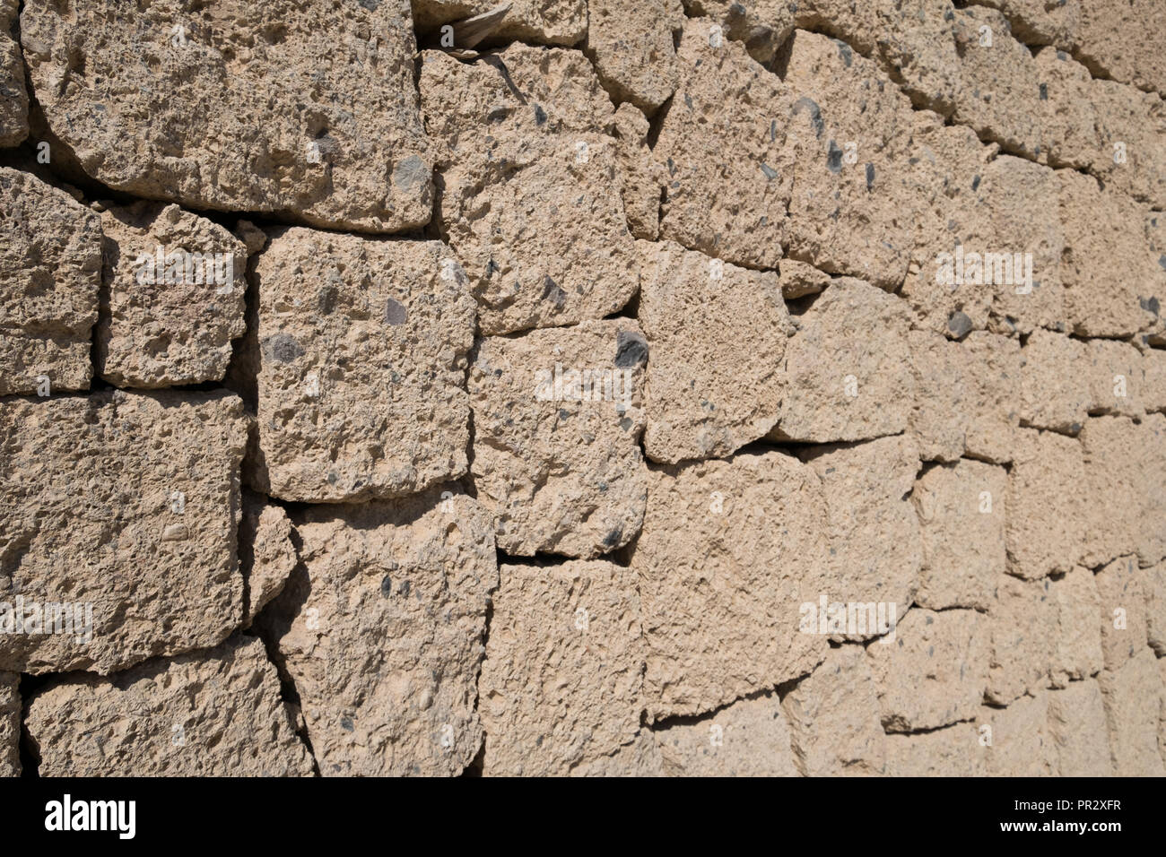 Ignimbrite Steinmauer - Naturstein Wand Hintergrund, Stockfoto Ignimbrite Steinmauer - Naturstein Wand Hintergrund, Stockfoto