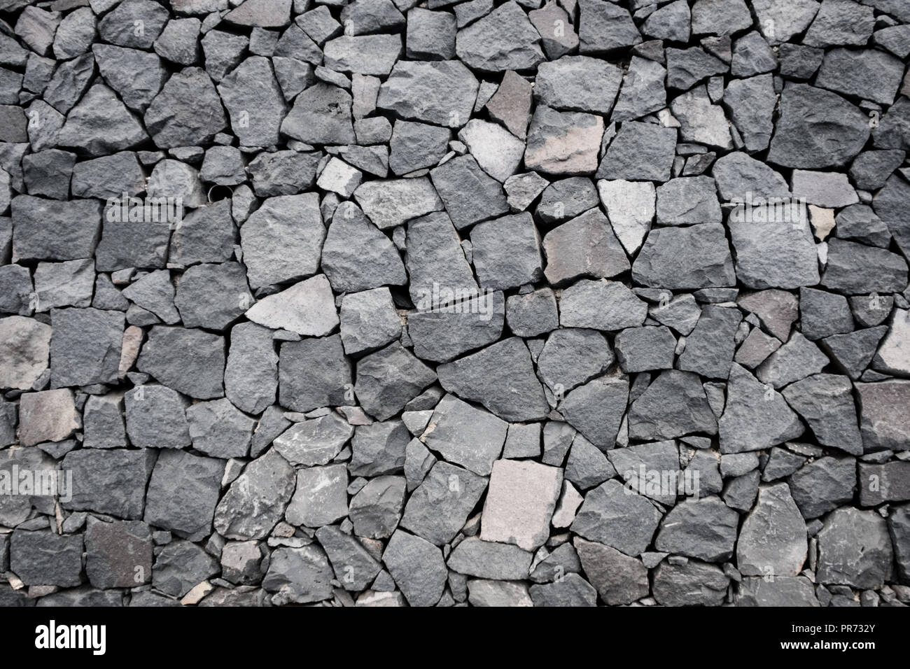 Natursteinmauer Hintergrund. Textur einer Steinmauer - Stockfoto