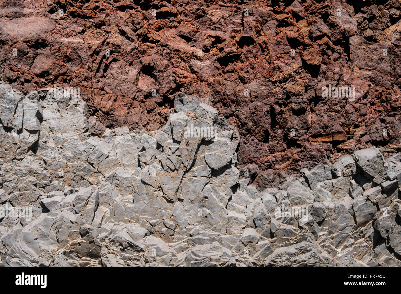 Felsen Schichten, mehrschichtige roten und grauen Rock Hintergrund Stockfoto