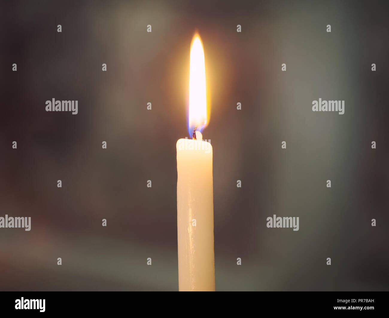 Single lit Candle light Stockfoto