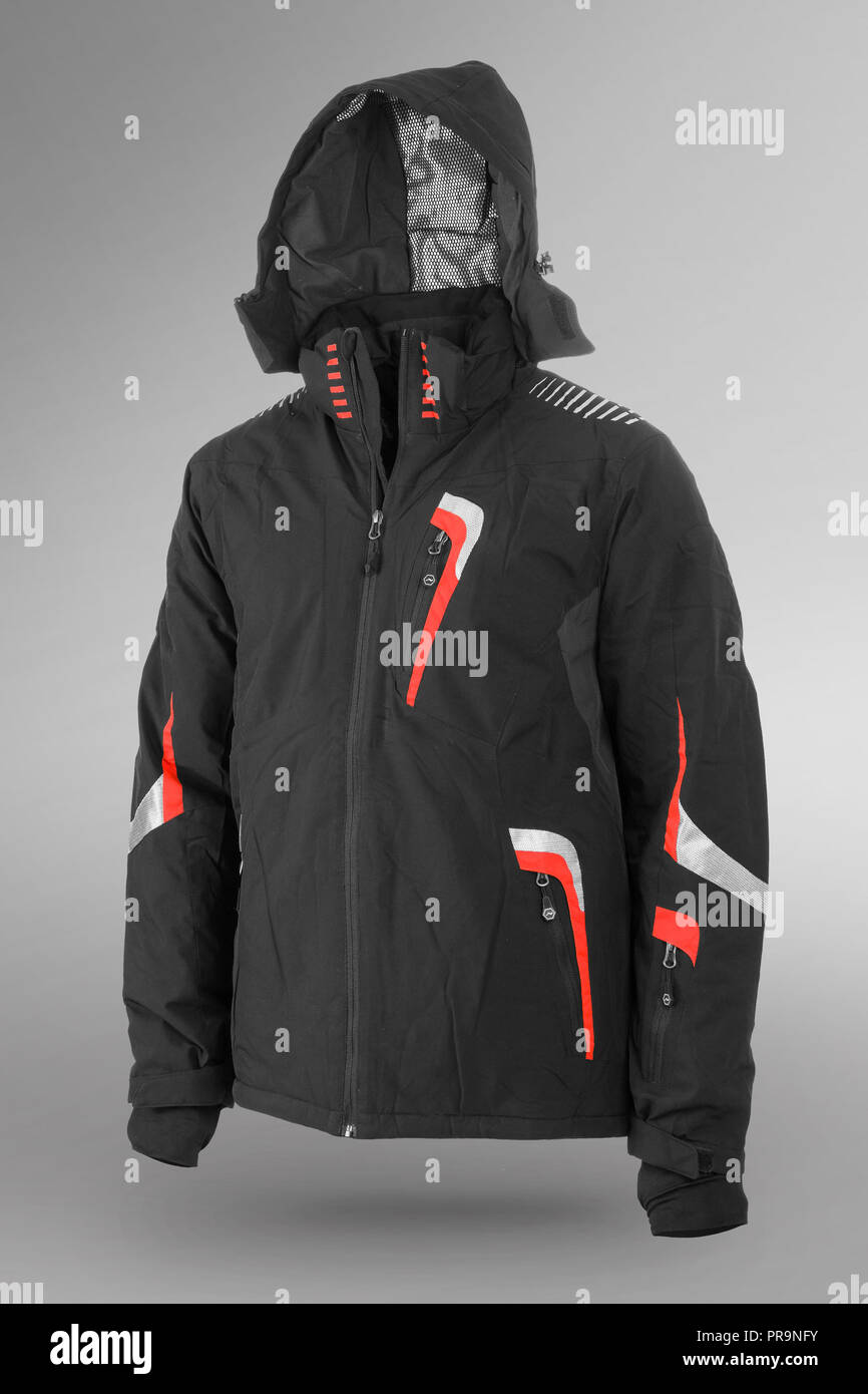 Schwarz warme Sport Jacke mit Kapuze auf grauem Hintergrund Stockfotografie  - Alamy