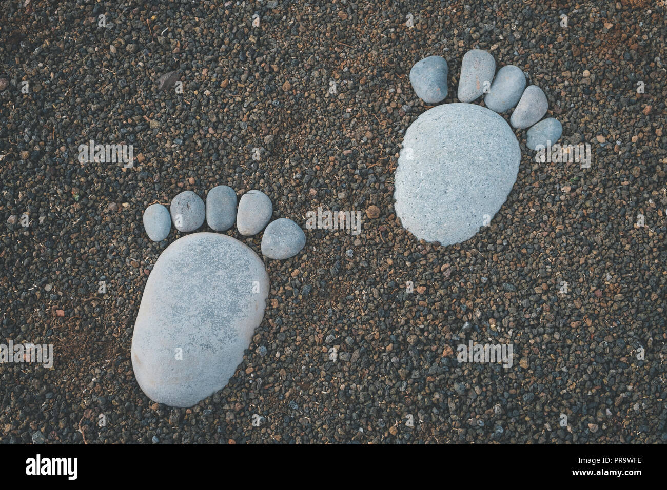 Füße, Spuren aus Stein, Stein Footprint Stockfoto