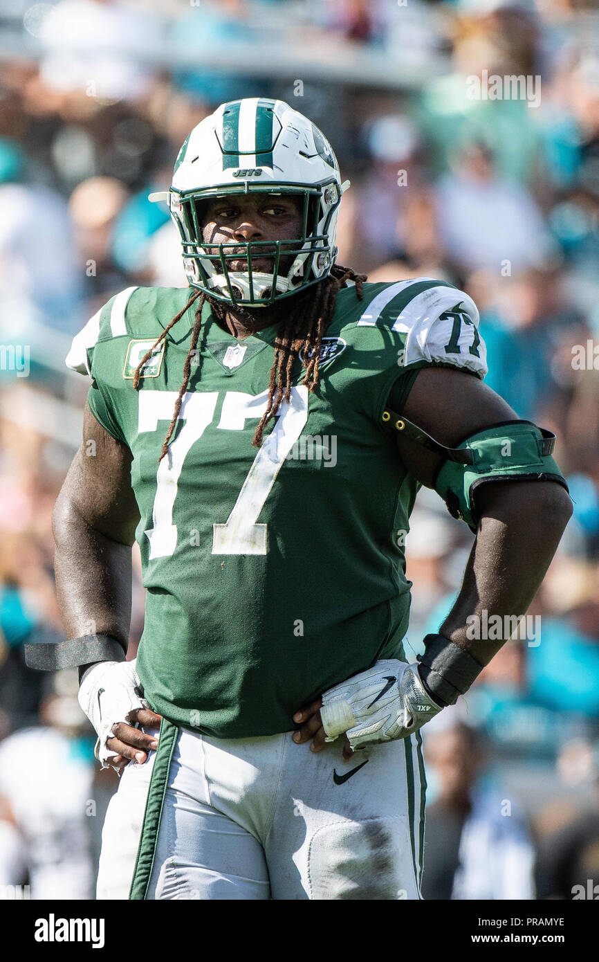 Jacksonville, FL, USA. 30 Sep, 2018. New York Jets offensive guard James Carpenter (77) während der zweiten Hälfte NFL Football Spiel zwischen den New York Jets und die Jacksonville Jaguars. Jaguare besiegt Jets 31-12 an tiaa Bank Feld in Jacksonville, FL. Romeo T Guzman/CSM/Alamy leben Nachrichten Stockfoto