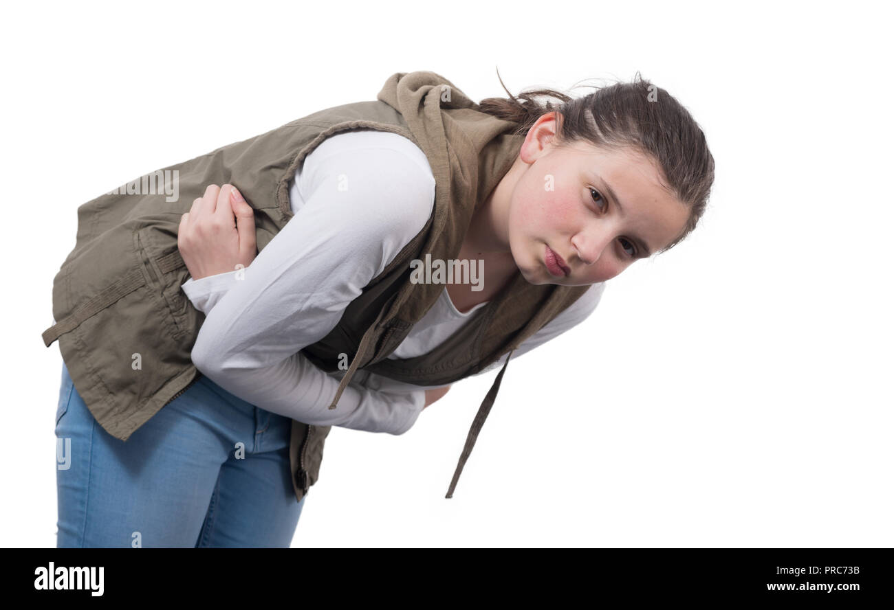 Junges Mädchen mit Magenschmerzen auf weißem Hintergrund Stockfoto