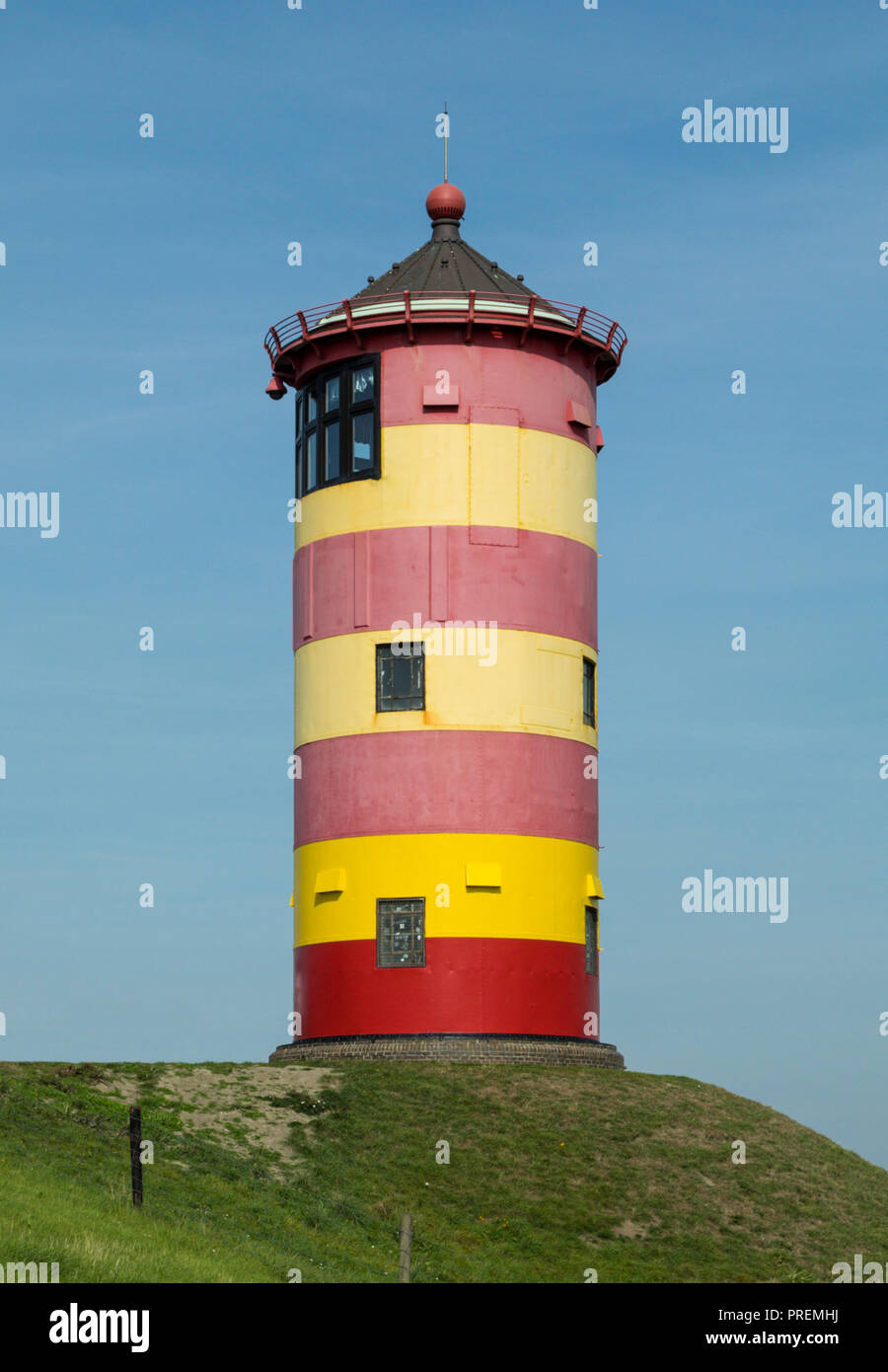 Berühmten kleinen Leuchtturm von Pilsum, Ostfriesland, Deutsche Nordsee region Stockfoto