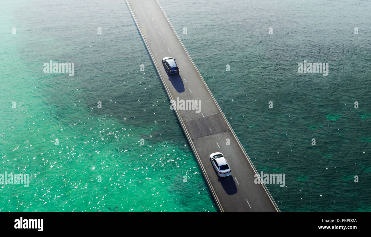 Zwei Auto pass auf Überführung Brücke an Meer, Luftbild. Stockfoto
