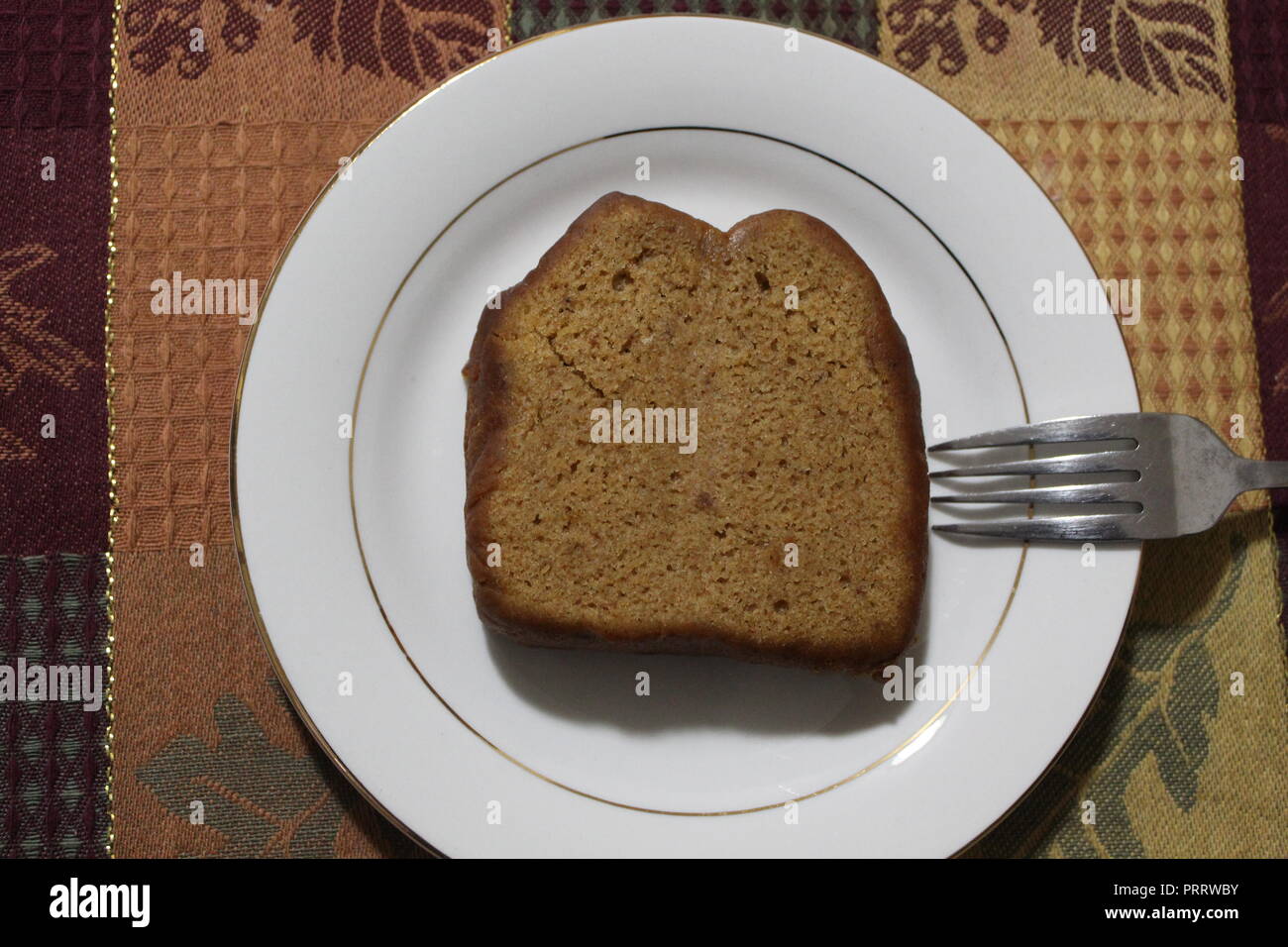 Kürbis Brot und Platte auf einem grünen - Tischset Stockfoto