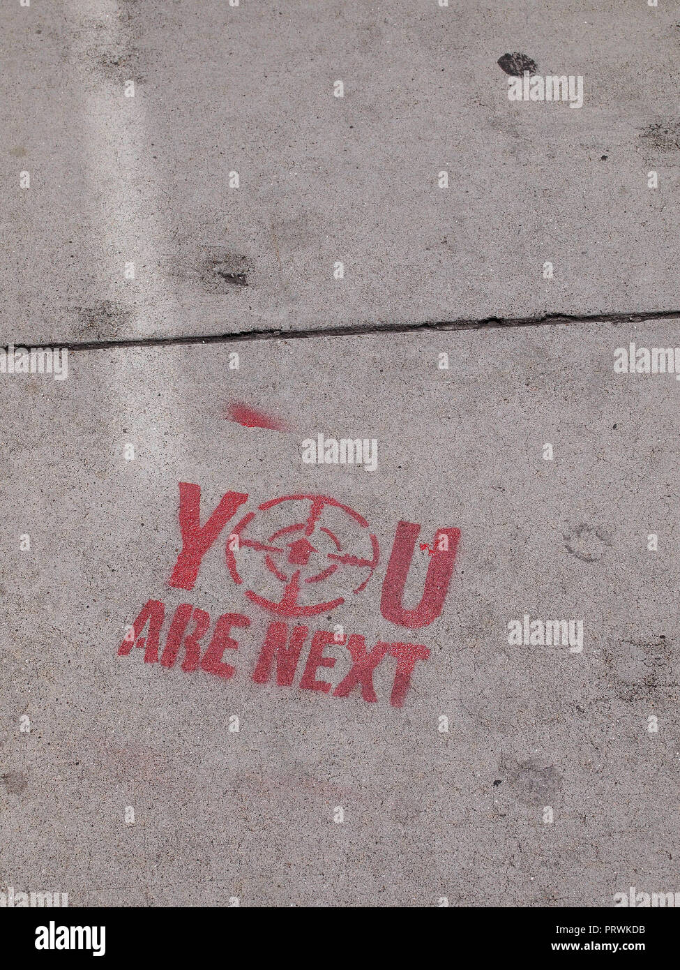 Sie sind die nächsten, Graffiti auf einem San Francisco stenciled, Gehweg Stockfoto