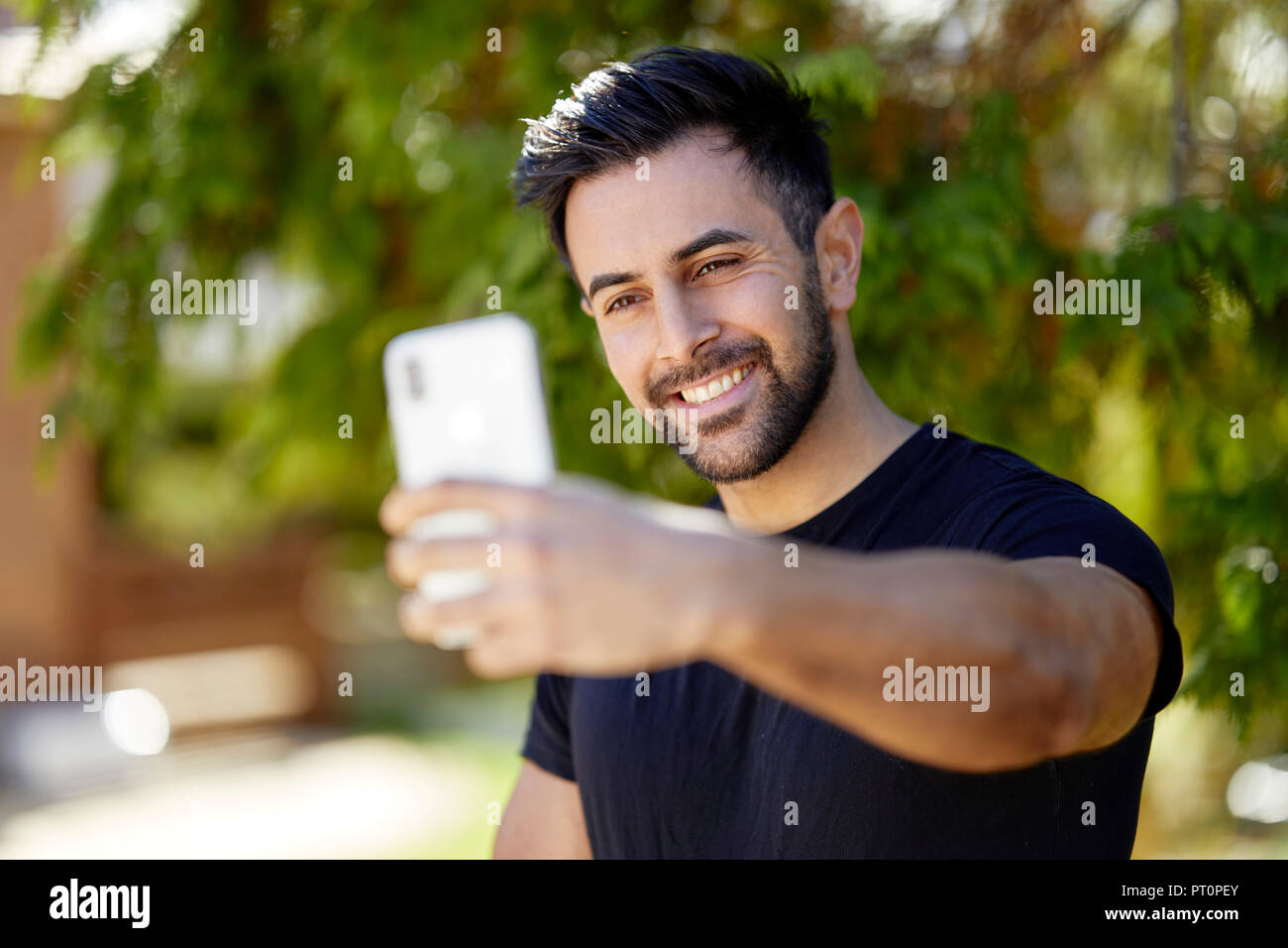Männliche eine selfie mit seinem Telefon Stockfoto
