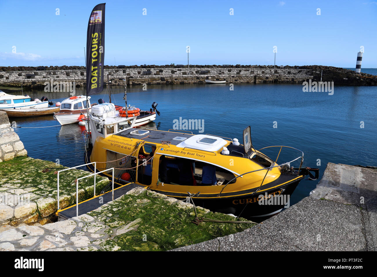 Boote lyingin Llanrwst Harbour, County Antrim, Nordirland, Großbritannien Stockfoto